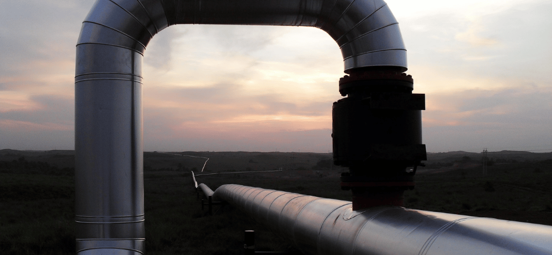 Pipeline bend on a hydrocarbon transmission line at sunset